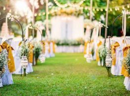 Beautiful wedding ceremony in garden at sunset